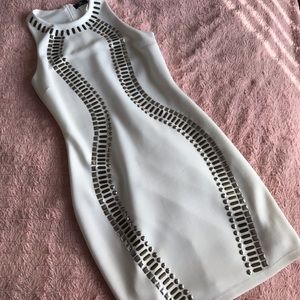 White cocktail dress with brass detail